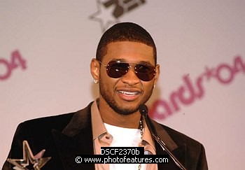 Photo of Usher  at the 2004 BET Awards Nominees announcement ceremony at the Renaissance Hotel in Hollywood May 11th 2004. , reference; DSCF2370b