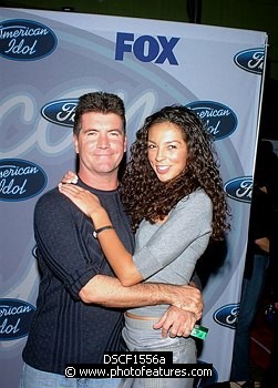 Photo of Simon Cowell (American Idol judge) and Terri Seymour at party to celebrate the American Idol Top 12 Finalists at Pearl in Hollywood. , reference; DSCF1556a