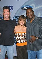 Photo of American Idol Judges Simon Cowell, Paula Abdul and Randy Jackson at party to celebrate the American Idol Top 12 Finalists at Pearl in Hollywood.