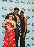 Photo of American Idol Winners. Kelly Clarkson (series1) Ruben Studdard (series2) and Fantasia Barrino, winner of American Idol 3, at American Idol 3 Finale, Kodak Theater in Hollywood, May 26th 2004.