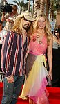 Photo of Rob Zombie and wife Sheri Moon<br>at the 2005 MTV Movie Awards at the Shrine Auditorium in Los Angeles, June 4th 2005