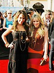 Photo of Haylie Duff and Hilary Duff<br>at the 2005 MTV Movie Awards at the Shrine Auditorium in Los Angeles, June 4th 2005.