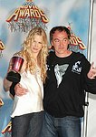 Photo of Darryl Hannah and Quentin Tarantino (Best Fight in &quotKill Bill Vil 2")<br>in Press Room at the 2005 MTV Movie Awards at the Shrine Auditorium in Los Angeles, June 4th 2005. 