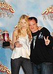 Photo of Darryl Hannah and Quentin Tarantino (Best Fight in &quotKill Bill Vil 2")<br>in Press Room at the 2005 MTV Movie Awards at the Shrine Auditorium in Los Angeles, June 4th 2005.