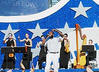 Photo of Kanye West performs at the NFL Opening Kickoff 2005 at the Los Angeles Coliseum