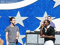 Photo of Maroon 5's Adam Levine and Kanye West performs at the NFL Opening Kickoff 2005 at the Los Angeles Coliseum