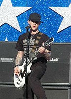 Photo of Good Charlotte's Joel Madden performs at the NFL Opening Kickoff 2005 at the Los Angeles Coliseum