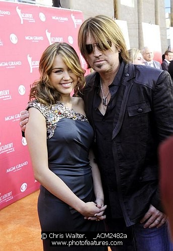 Photo of Miley Cyrus and Billy Ray Cyrus at the 2009 Academy Of Country Music Awards at the MGM Grand in Las Vegas, April 5th 2009.<br>Photo bt Chris Walter-Photofeatures , reference; _ACM2482a