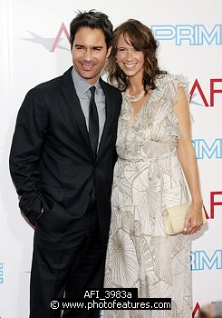 Photo of Eric McCormack and Janet Holden at the 37th AFI Life Achievement Awards Honoring Michael Douglas at Sony Studios, Culver City on June 11th 2009. , reference; AFI_3983a