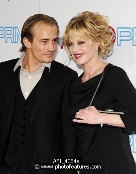 Photo of Jesse Johnson and Melanie Griffith at the 37th AFI Life Achievement Awards Honoring Michael Douglas at Sony Studios, Culver City on June 11th 2009.  , reference; AFI_4054a