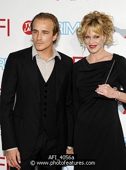 Photo of Jesse Johnson and Melanie Griffith at the 37th AFI Life Achievement Awards Honoring Michael Douglas at Sony Studios, Culver City on June 11th 2009.  , reference; AFI_4056a
