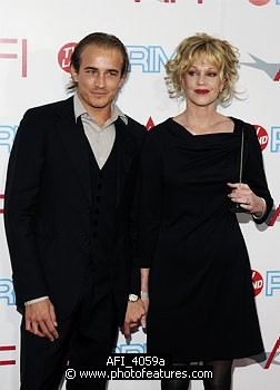 Photo of Jesse Johnson and Melanie Griffith at the 37th AFI Life Achievement Awards Honoring Michael Douglas at Sony Studios, Culver City on June 11th 2009.  , reference; AFI_4059a