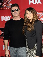 Photo of Simon Cowell and Melanie Amaro at the 2011 X Factor finale press conference at CBS Television City in Los Angeles, December 19th 2011.<br>Photo by Chris Walter/Photofeatures