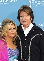 Photo of John Fogerty and wife Julie at the 2010 Academy Of Country Music (ACM) Awards at the MGM Grand in Las Vegas, April 18th, 2010.