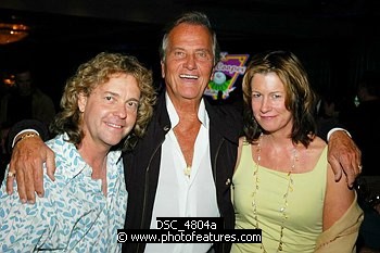 Photo of Pat Boone (c) with Jack Blades of Nightranger and his wife Mollie<br>at the 9th Annual Alice Cooper Celebrity Golf Tournament in Scottsdale, Arizona, May 1st 2005.  Photo by Chris Walter/Photofeatures. , reference; DSC_4804a