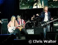 Tommy Shaw, Ted Nugent, Michael Cartellone in Damn Yankees which played together for first time in 10 years at Alice Cooper's Christmas Pudding show for his Solid Rock Foundation Charity at Dodge Theatre in Phoenix, Arizona, December 18th 2004. Photo by Chris Walter/Photofeatures.