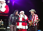 Alice Cooper, Santa Claus and Ted Nugent at Alice Cooper's Christmas Pudding show for his Solid Rock Foundation Charity at Dodge Theatre in Phoenix, Arizona, December 18th 2004. Photo by Chris Walter/Photofeatures.
