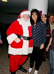 Alice Cooper and Santa Claus at Alice Cooper's Christmas Pudding show for his Solid Rock Foundation Charity at Dodge Theatre in Phoenix, Arizona, December 18th 2004. Photo by Chris Walter/Photofeatures.