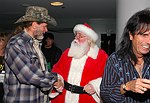 Ted Nugent and Santa Claus at Alice Cooper's Christmas Pudding show for his Solid Rock Foundation Charity at Dodge Theatre in Phoenix, Arizona, December 18th 2004. Photo by Chris Walter/Photofeatures.