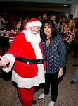Alice Cooper and Santa Claus at Alice Cooper's Christmas Pudding show for his Solid Rock Foundation Charity at Dodge Theatre in Phoenix, Arizona, December 18th 2004. Photo by Chris Walter/Photofeatures.