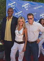 Sienna Miller with Colin salmon and Mark Valley from &quotKeen Eddie"<br>at the finals of the second series of &quotAmerican Idol' at Universal Amphitheatre.