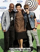 BET Awards Producer Srephen Hill, BET Chairman and CEO Debra Lee with Justin Bieber at the 2011 BET Awards at the Shrine Auditorium on June 26th, 2011 in Los Angeles, California