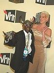 Photo of Flavor Flav and Brigitte Nielson<br>