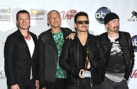 Photo of U2 Larry Mullen, Jr., Adam Clayton, Bono and The Edge at the 2011 Billboard Music Awards at the MGM Grand Arena in Las Vegas, May 22nd 2011.<br><br>Photo by Chris Walter/Photofeatures