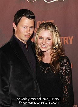 Photo of Beverley Mitchell and fiance Michael Cameron<br> at the CMT TV Giants Honoring Reba McEntire at Kodak Theatre, October 26th 2006.<br>Photo by Chris Walter/Photofeatures , reference; beverley-mitchell-cmt_0139a