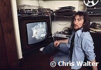 Roger Glover 1975 of Deep Purple at home reviewing Butterfly Ball graphics<br> Chris Walter