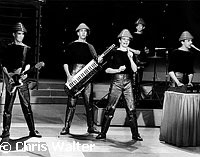 Devo 1980  Bob Mothersbaugh, Bob Casale, Mark Mothersburgh, Alan Myers and Gerald Casale.   Chris Walter