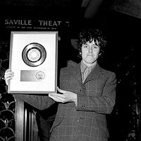 Photo of Donovan 1967 with &quotSunshine Superman" US Gold Record<br> Chris Walter<br>