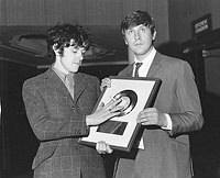 Photo of Donovan 1967 with producer Mickie Most and &quotSunshine Superman US Gold Disc<br> Chris Walter<br>