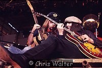 Photo of Doobie Brothers 1977 Jeff Baxter and Pat Simmons at Reading Festival
