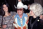 Photo of Emmylou Harris, Nudie Cohn and Dolly Parton 1978<br> Chris Walter<br>