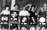Photo of Go Go's 1982 with Platinum Albums for Beuty And The Beat<br>
