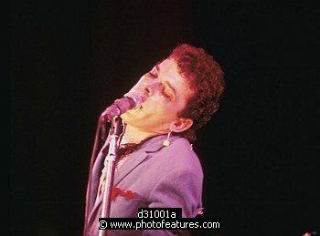Photo of Ian Dury by Chris Walter , reference; d31001a,www.photofeatures.com