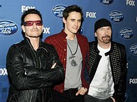 Photo of Bono and the Edge of U2 with Reeve Carney from Spider-Man at the 2011 American Idol Finale at Nokia Theatre in Los Angeles, May 25th 2011.<br><br>Photo by Chris Walter/Photofeatures