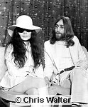 Photo of Beatles 1969 John Lennon and Yoko Ono at Heathrow Airport<br> Chris Walter<br>