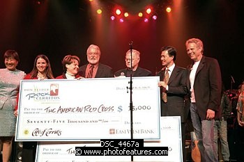 Photo of Don Felder (r) and sponsors East West Bank and City of Cerritos present proceeds to Red Cross and Salvation Army at Don Felder and friends Rock Cerritos for Katrina at Cerritos Center For The Performing Arts, February 1st 2006.<br>Photo by Chris Walter/Photofeatures , reference; DSC_4467a
