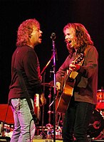 Photo of Jack Blades and Tommy Shaw - Shaw Blades<br>at Don Felder and friends Rock Cerritos for Katrina<br>at Cerritos Center For The Performing Arts, February 1st 2006.<br>Photo by Chris Walter/Photofeatures