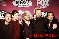 Metallica 1999 Lars Ulrich, Jason Newsted, James Hetfield and Kirk Hammett with conductor Michael Kamen at 1999 Billboard Awards
