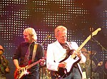 Styx's James Young and Don Felder<br>at Alice Cooper's Christmas Pudding show to benefit his Solid Rock Foundation for children, Dodge Theatre in Phoenix, December 17th 2005.<br>Photo by Chris Walter/Photofeatures
