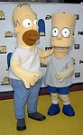Photo of Homer Simpson and Bart Simpson at the Cast and Crew Block Party to celebrate the 400th episode, Fox Studios 8th May 2007.<br>Photo by Chris Walter/Photofeatures.