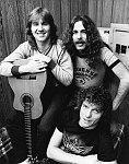 Photo of Triumph 1983 Rik Emmett, Mike Levine and Gil Moore<br> Chris Walter<br>