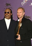 Photo of Stevie Wonder presents Century Award to Sting at 2003 Billboard Awards in Las Vegas