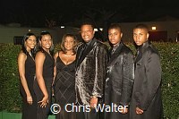 Judge Greg Mathis (c) and wife and children