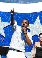 Photo of Kanye West performs at the NFL Opening Kickoff 2005 at the Los Angeles Coliseum