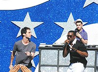 Photo of Maroon 5's Adam Levine and Kanye West performs at the NFL Opening Kickoff 2005 at the Los Angeles Coliseum