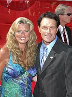 Photo of Doug Flutie (right) and Laurie Flutie